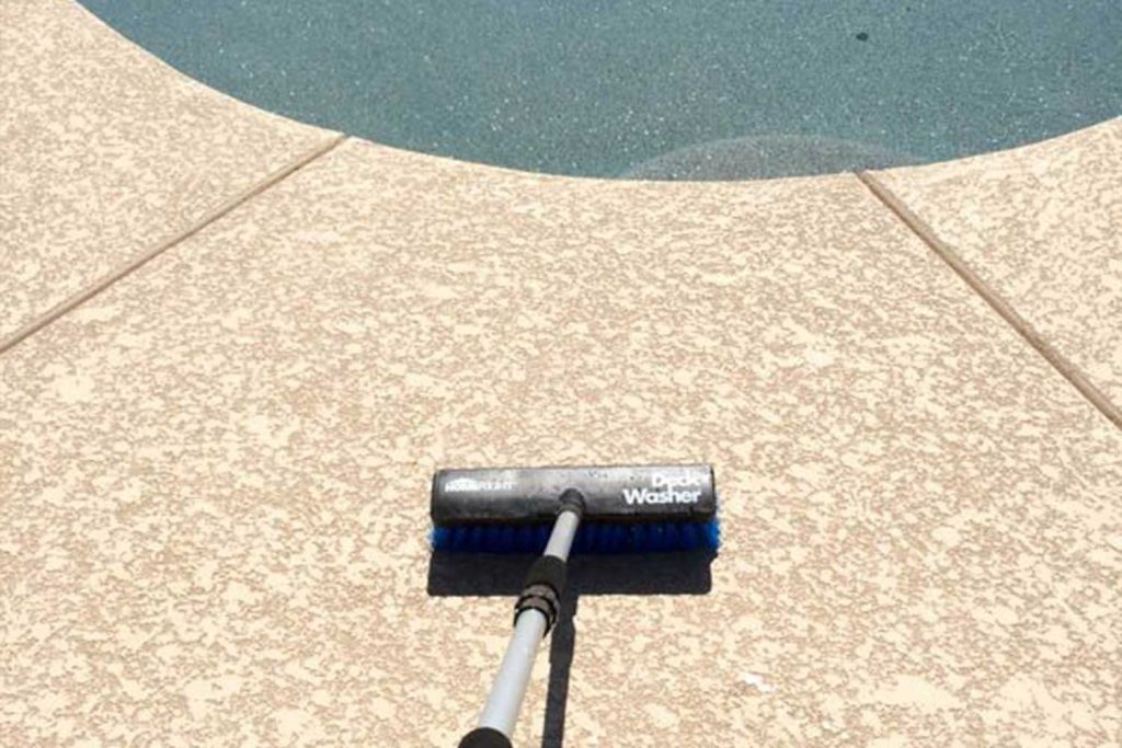 Well-cared-for pool deck complementing the home's exterior