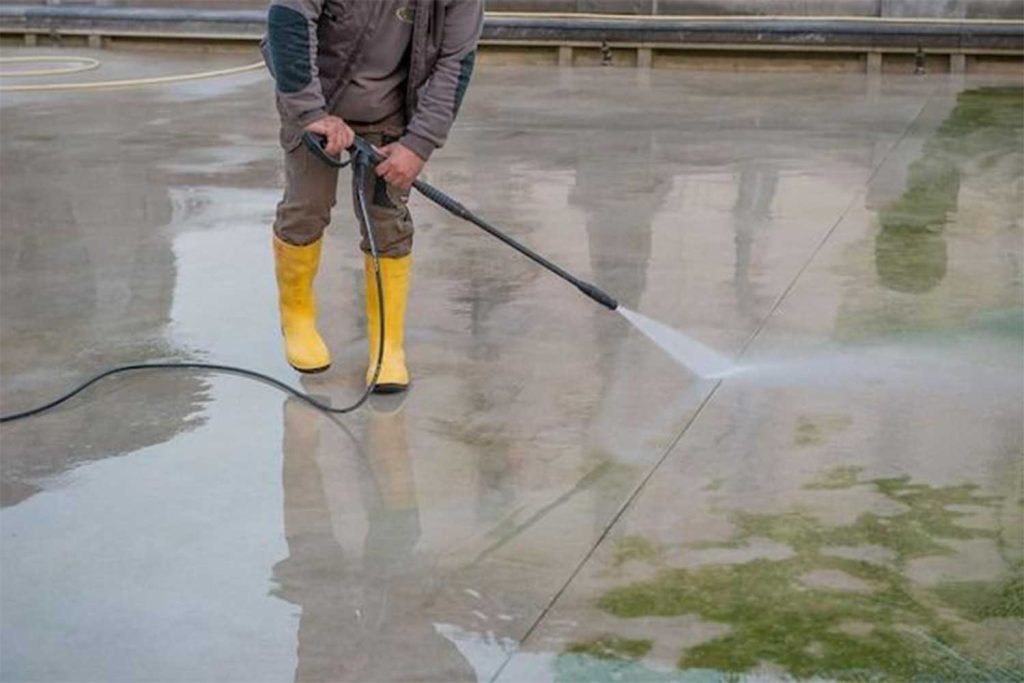 Pool deck surface after dirt and stain removal