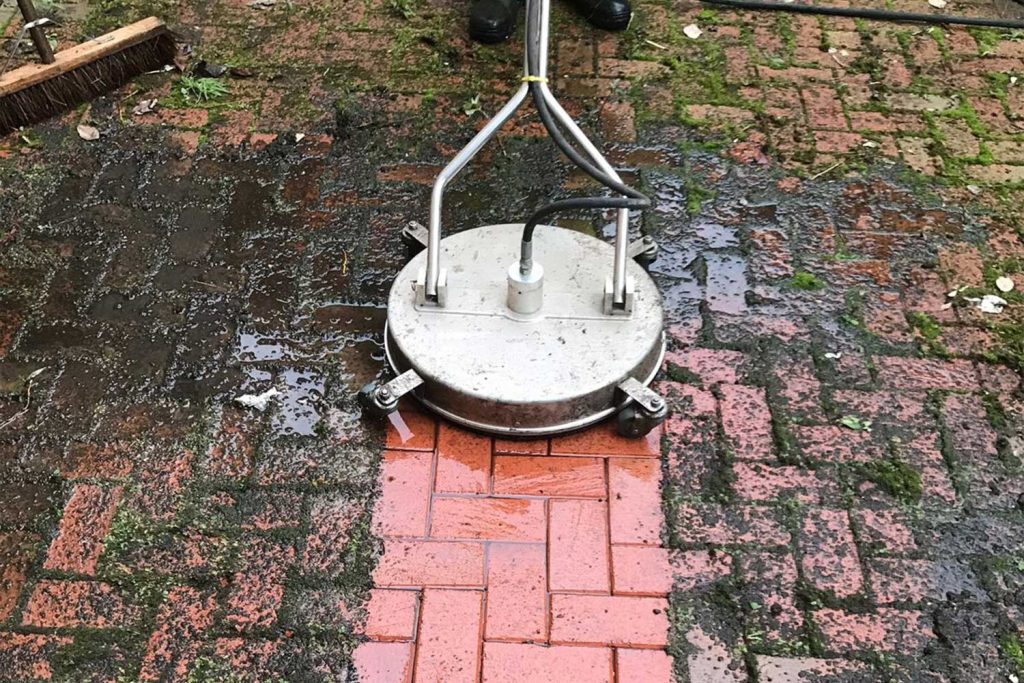 Driveway stain removal before and after